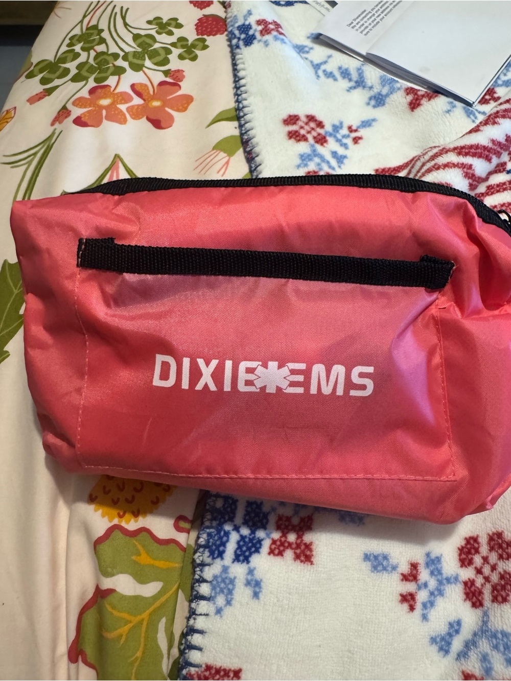 Pink stethoscope , bag and bp cuff.